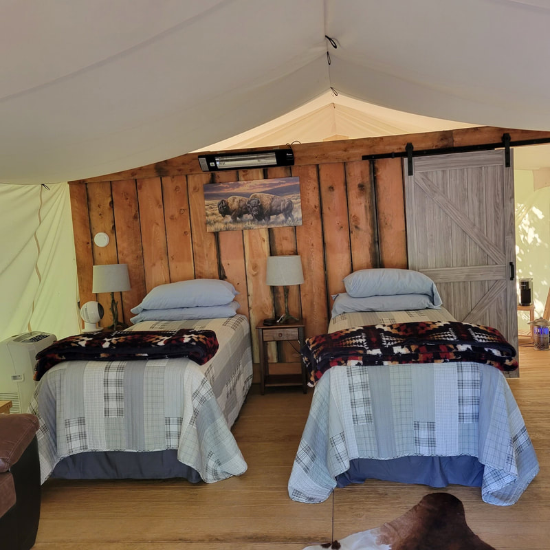 Canvas accommodation tent at the Flagship Lodge