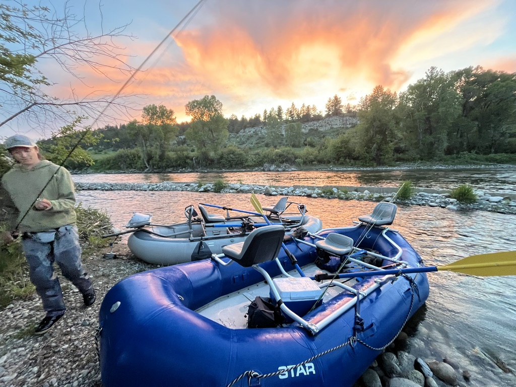Fly fishing on a Montana river at golden hour