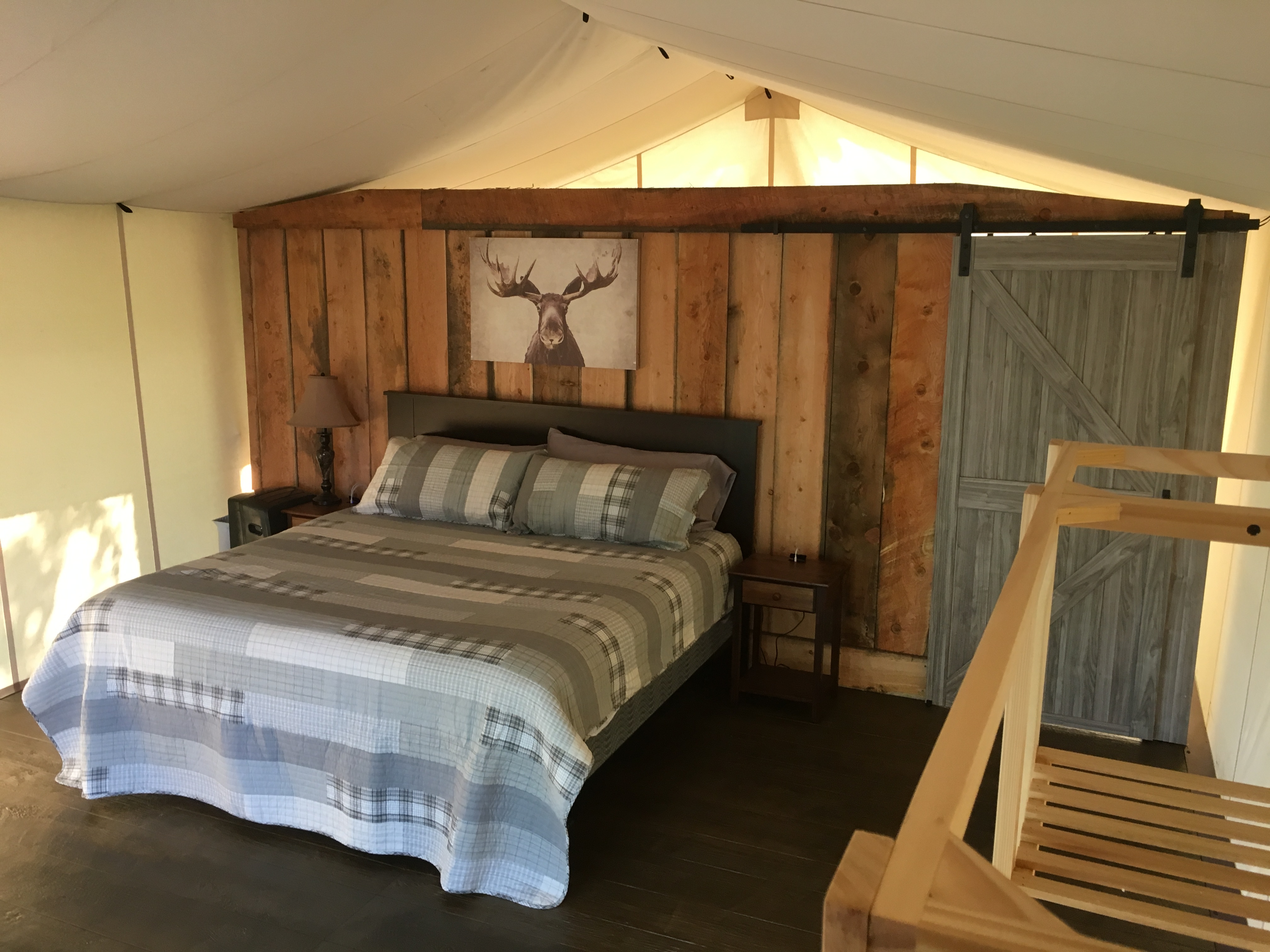 Safari tent bedroom with rustic decor