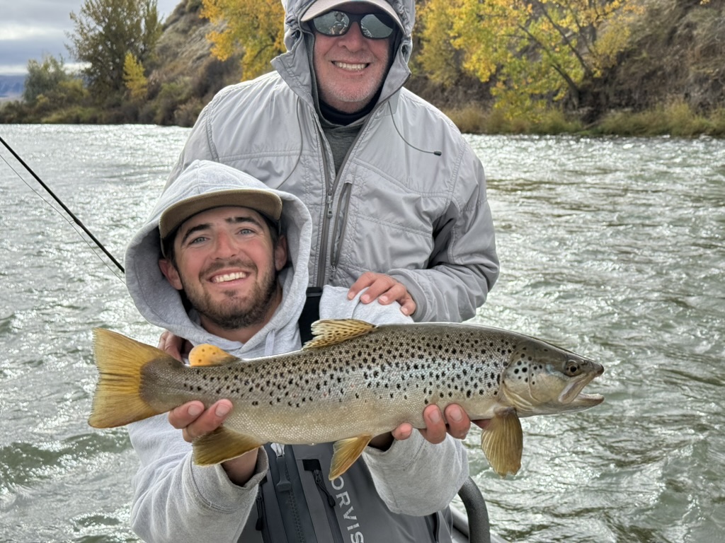 Two anglers with a catch on the Shoshone riverbank